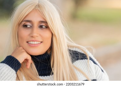 Portrait Of Pretty Blonde Girl Outdoors In Autumn