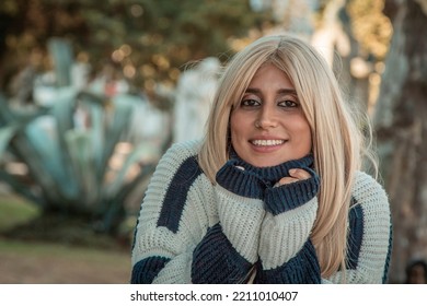 Portrait Of Pretty Blonde Girl Outdoors In Autumn