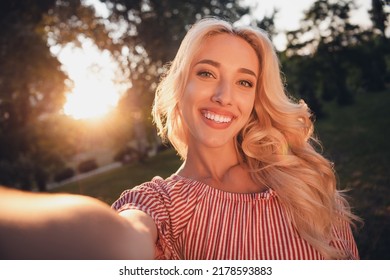 Portrait Of Pretty Cheerful Girl Make Selfie Toothy Smile Enjoy Warm Sunny Weather Outside