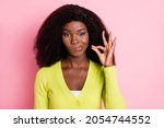 Portrait of pretty dark skin person arm fingers show shut up near lips isolated on pink color background