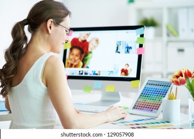 Portrait Of Pretty Female Designer Working With Colors At Home