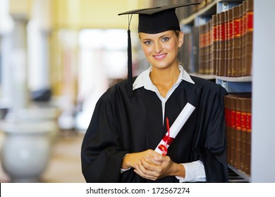 Portrait Of Pretty Female Law School Graduate In Library