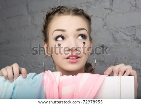 portrait of pretty girl in make up like doll
