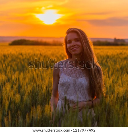 Image, Stock Photo laughing, blonde woman, sunset, field