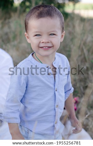 Similar – Cute little boy toaching the water with his feet.