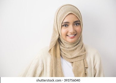 portrait of pretty oung asian muslim woman in head scarf smile