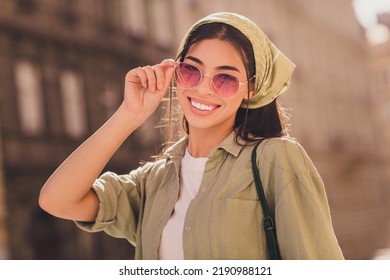 Portrait Of Pretty Positive Satisfied Girl Hand Touch Sunglass Beaming Smile Enjoy Sunny Weather Outside