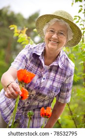 Portrait Of Pretty Senior Woman Gardening