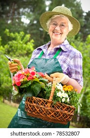 Portrait Of Pretty Senior Woman Gardening