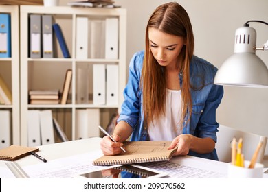 Portrait Of Pretty Student Making Sketch At Lesson