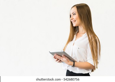 Portrait Of Pretty Successful Attractive Business Woman Holding Tablet With Confident Full Mouth Smile.Tablet Computer.Woman Using Digital Tablet Computer PC Happy Isolated Background