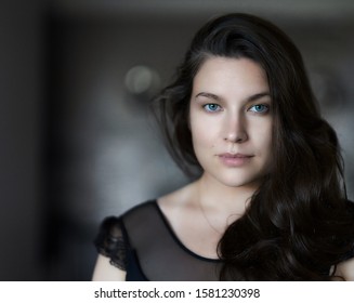 Portrait of pretty woman dark hair, blue eyes. Womans face. portrait of beautiful woman. portrait of young woman. - Shutterstock ID 1581230398
