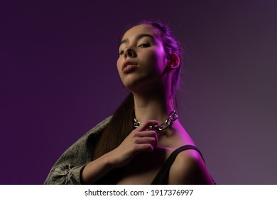 Portrait Of Pretty Woman Dark Hair, With Purple Backsplash