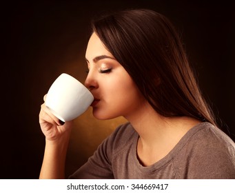 Portrait Of Pretty Woman Drinking Coffee, Close Up