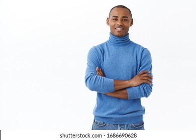 Portrait Of Professional, Confident African American Bold Guy In Blue Turtleneck Smiling Pleased, Making Good Profit, Big Investment, Standing White Background Satisfied