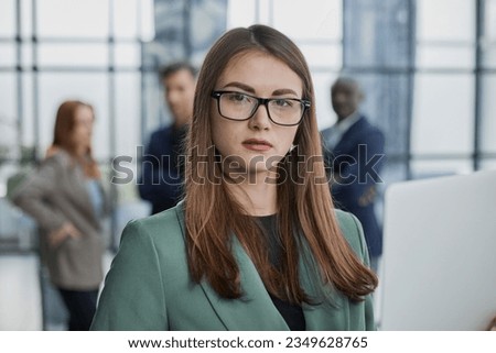 Portrait, Professional and confident millennial businesswoman or female executive manager in formal suit and eyeglasses