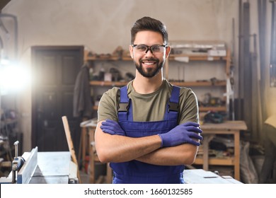 Portrait of professional male carpenter in workshop - Powered by Shutterstock