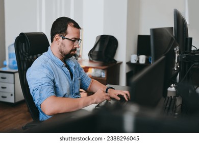 Portrait professional man programmer working concentrated on computer in diverse offices. Modern IT technologies, development artificial intelligence, programs, applications and video games concept