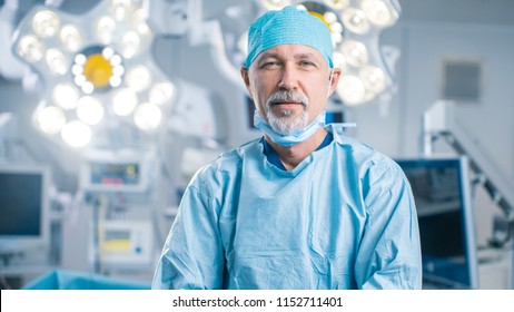 Portrait of the Professional Surgeon Looking Into Camera and Smiling after Successful Operation. In the Background Modern Hospital Operating Room. - Shutterstock ID 1152711401