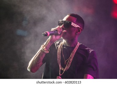 Portrait Of Rapper Soulja Boy With Microphone. Cool Young American  Rap Singer DeAndre Cortez Way Wearing Thick Golden Chains Singing In Mic On Concert Stage. EUROPE - 1 MAY, 2015