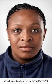 Portrait of real black african woman with no expression ID or passport photo full collection of diverse face and expressions