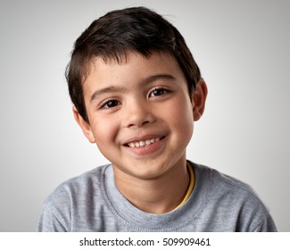 Portrait Of Real Happy Mixed Race Child Smiling