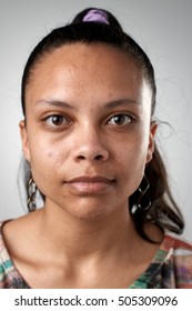 Portrait of real hispanic woman with no expression ID or passport photo full collection of diverse face and expressions