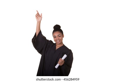 Portrait Of A Recent College Graduate In Gown Holding Her Diploma Isolated On White