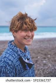 Portrait Of A Red-haired Girl With Freckles, A Woman With Short Hair, Wind In Her Hair, A Walk Along The Coast, Smiling Girl On The Beach.