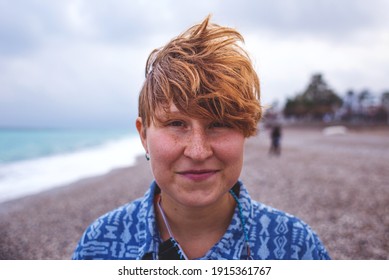 Portrait Of A Red-haired Girl With Freckles, A Woman With Short Hair, Wind In Her Hair, A Walk Along The Coast, Smiling Girl On The Beach.