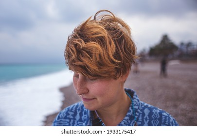 Portrait Of A Red-haired Girl With Freckles, A Woman With Short Hair, Wind In Her Hair, A Walk Along The Coast, Smiling Girl On The Beach.