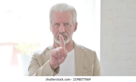 Portrait Of Rejecting Old Man Waving Hand