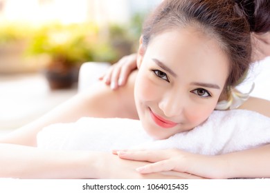 Portrait relaxed beautiful woman. Charming beautiful woman feel relaxed, happy with smiley face. Attractive beautiful girl love massage, aromatherapy at spa shop. Gorgeous woman has good healthcare