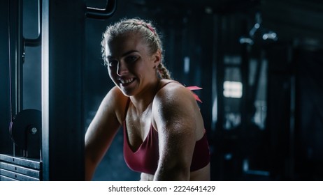Portrait Of A Relieved Woman Smiling After Successfully Finishing Her Extreme Workout Session. A Persevering Young Sportswoman Happy About Her Exercises And Training