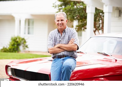 Portrait Of Retired Senior Man With Restored Car