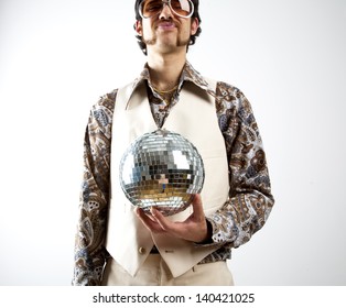 Portrait Of A Retro Man In A 1970s Leisure Suit And Sunglasses Holding A Disco Ball - Mirror Ball