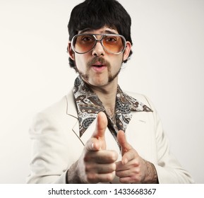 Portrait Of A Retro Man In A 1970s Leisure Suit And Sunglasses 