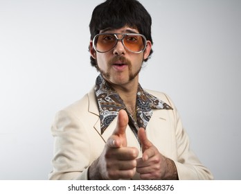 Portrait Of A Retro Man In A 1970s Leisure Suit And Sunglasses 