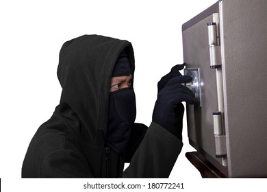 Portrait Of A Robber Trying To Open A Safe Isolated Over White