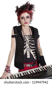 Portrait Of Rock Woman With Spiked Hair And Piano Over White Background