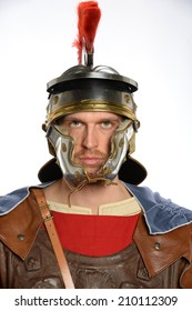 Portrait Of Roman Soldier Isolated Over White Background