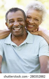 Portrait Of Romantic Senior African American Couple In Park