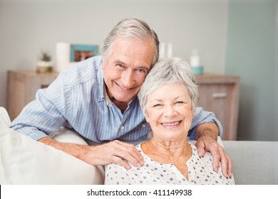 Portrait of romantic senior man with his wife at home