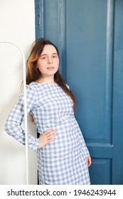 Portrait Of   Russian Teen Girl In   Dress On   Blue  Door Background