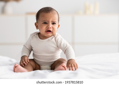 Portrait Of Sad Black Baby Crying Alone