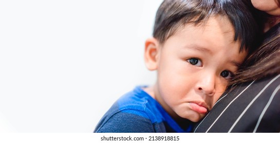Portrait sad boy child 2 years old want milk breast.feel hurt.Emotion.Asian kid boy crying looking camera.wayward child. Adhd. Feel dad toddler kid.Family parenting childhood Breastfeeding mother.