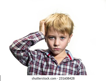 Portrait Of Sad Boy On A White Background