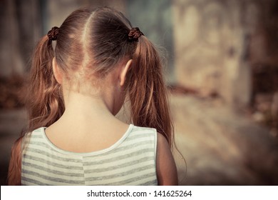 Portrait Of Sad Child