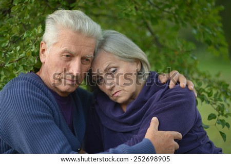 Portrait of a sad elder couple outdoor