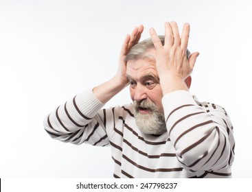 portrait of sad grandfather holding his head hands